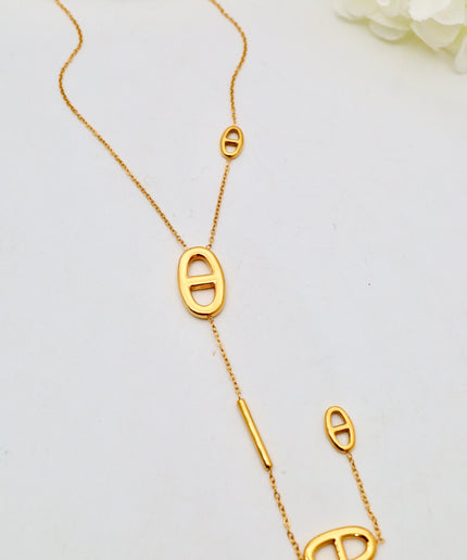 Collier Y - motifs ovales ajourés et barre